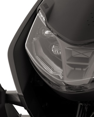 Front of the BMW CE 04 focussing on the LED headlights.